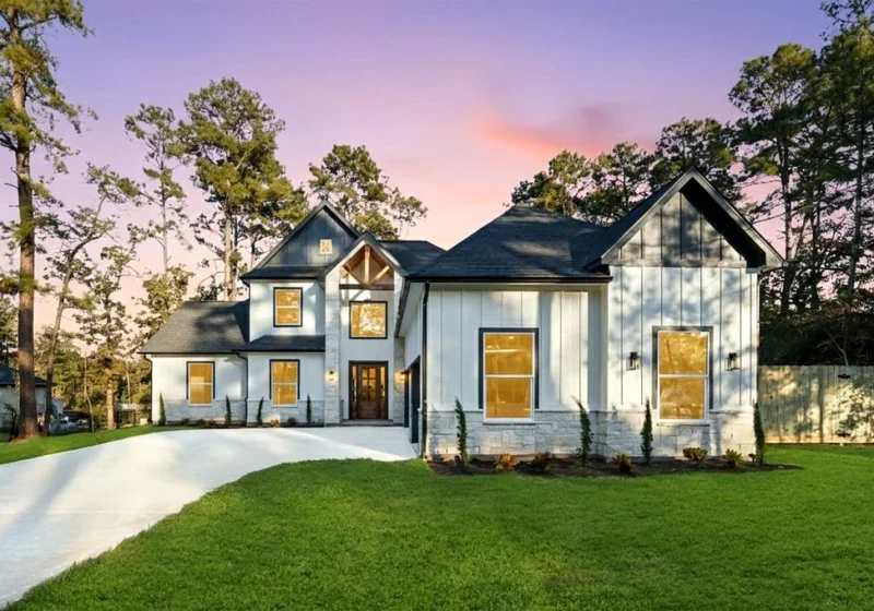 40714 Rolling Forest Dr, Magnolia TX — exterior front twilight