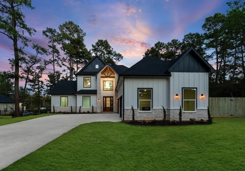 40714 Rolling Forest Dr, Magnolia TX — exterior front twilight